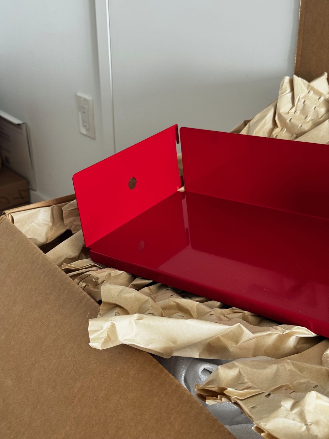 Red shelf unpacked from its shipping box